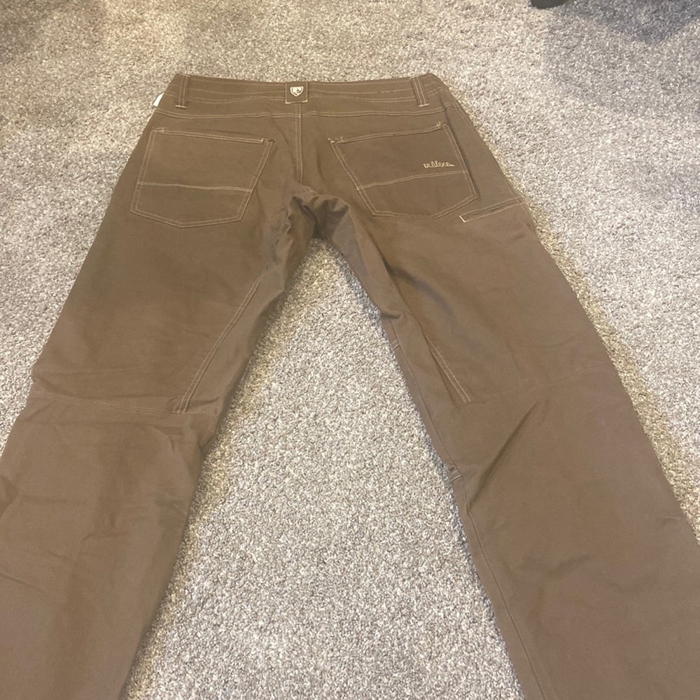 Kuhl.  New without tags.   Size 34 x 32.    Brown pants.